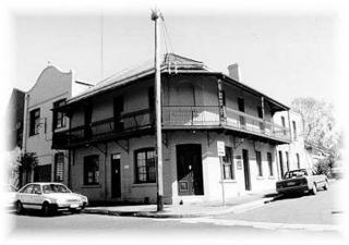 Michael and Johanna Ryan were running the Mertonville Hotel at the corner of Beattie and Lawson streets, Balmain in 1898. The hotel was established in the late 1870s to cater for new homes being built on the Mertonville Estate. The two storey brick corner pub became a popular meeting place for the fledging Labour movement in Balmain during the early 1900s. It now is a private residence